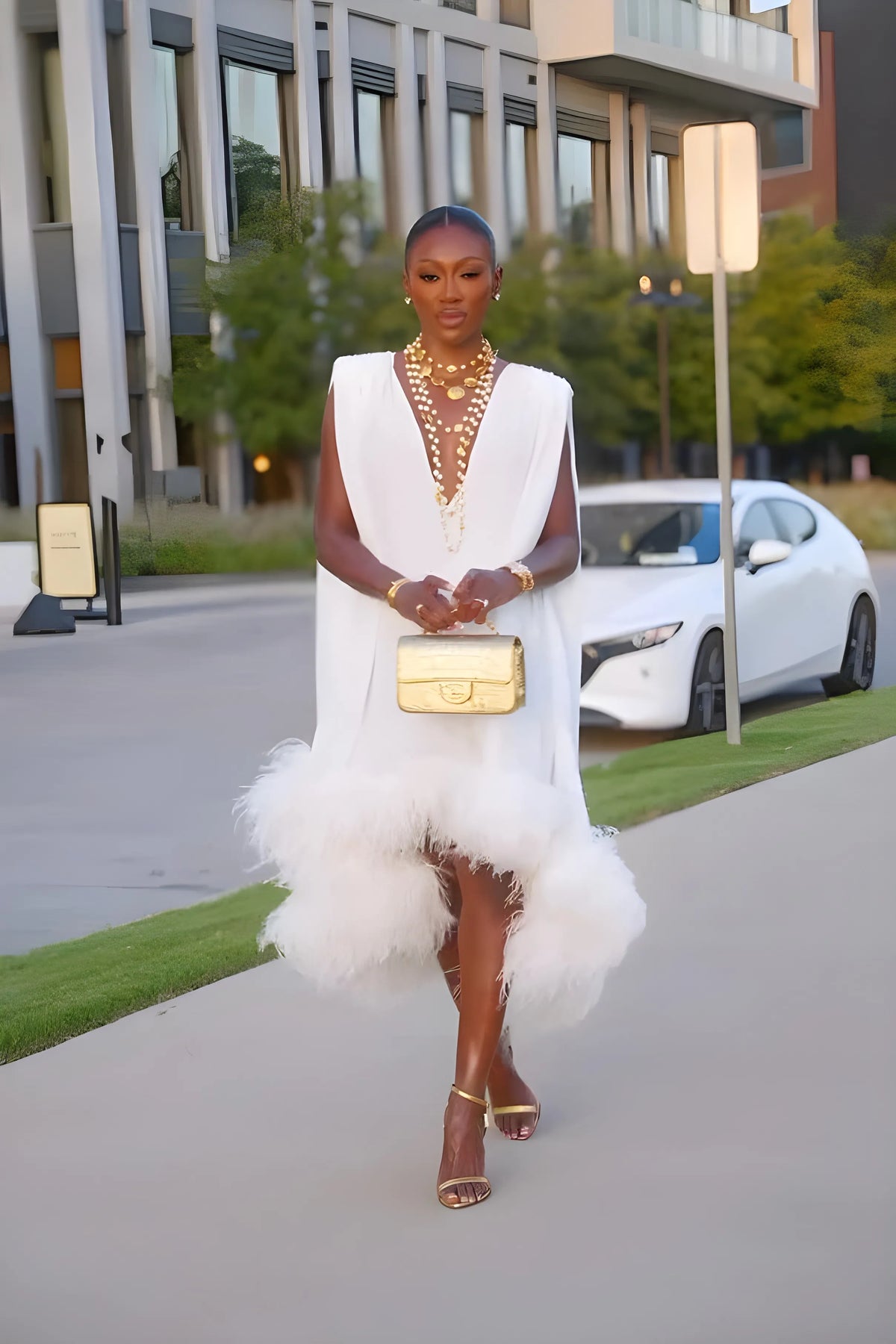 Women’s Sleeveless Elegant Midi Cocktail Dress with Feather Trim
